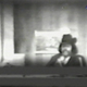 Image taken from an FBI surveillance tape from 1983 shows Al Sharpton talking to an undercover FBI agent posing as a drug dealer in New York City. The tape was broadcast on Real Sports With Bryant Gumbel on July 23, 2002. (HBO Sports/Getty Images)